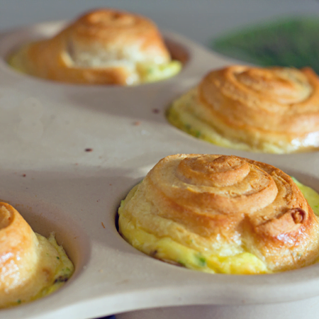 Portable breakfast! Dubliner Quiche Crescent Cups from ItsYummi.com #breakfast #quiche