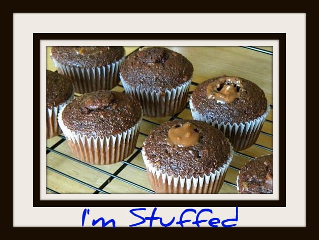Cupcake recipes don't get much better than these Snickers cupcakes, which are stuffed with homemade caramel sauce and Snicker's candy bars!