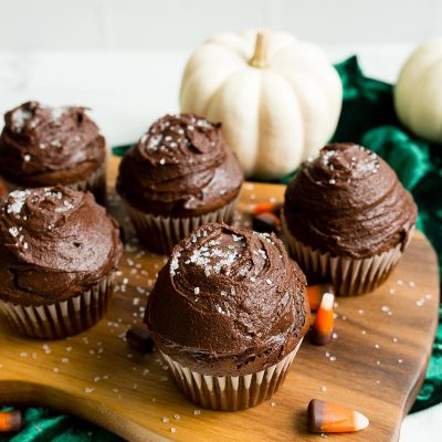 Chocolate Pumpkin Cupcakes on walnut cutting board