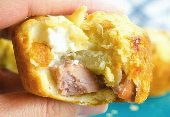 pineapple ham crescent roll appetizers with the center revealed