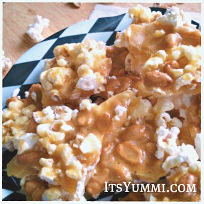 Popcorn peanut brittle is a salty-sweet treat, perfect for game day munchies, holiday food gifts, or for no special occasion at all! | Recipe on itsyummi.com