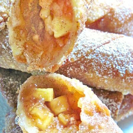 Easy Apple Pie Egg Rolls Recipe - These are a delicious snack or dessert, and SO good dipped into caramel sauce!