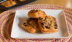 Cheesy Sausage Biscuits Recipe, from ItsYummi.com - Perfect for a grab 'n go breakfast or a relaxing weekend brunch.