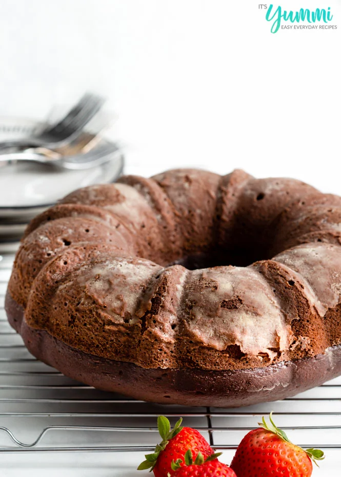 Easy Chocolate bundt cake is everything you dream of when you want a moist, decadent chocolate cake and a extra splash of coffee for good measure - Recipe on ItsYummi.com