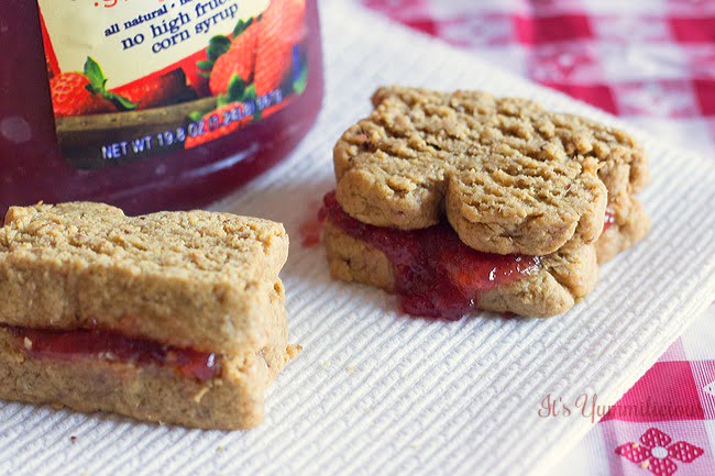 Low carb snack ideas start with these peanut butter and jelly sandwich cookies. Lower in sugar, they're a healthy snack. Kid friendly, too!