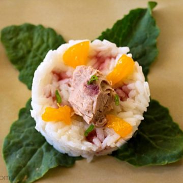 Skipjack Tuna Stack from ItsYummi.com - Skipjack tuna is stacked on top of lime infused rice, cucumber, and Mandarin oranges, then it's all drizzled with a delicious pomegranate reduction. Delicious as an appetizer, lunch, or light dinner.