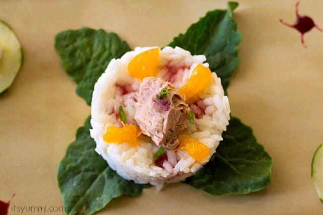 Skipjack Tuna Stack from ItsYummi.com - Skipjack tuna is stacked on top of lime infused rice, cucumber, and Mandarin oranges, then it's all drizzled with a delicious pomegranate reduction. Delicious as an appetizer, lunch, or light dinner.