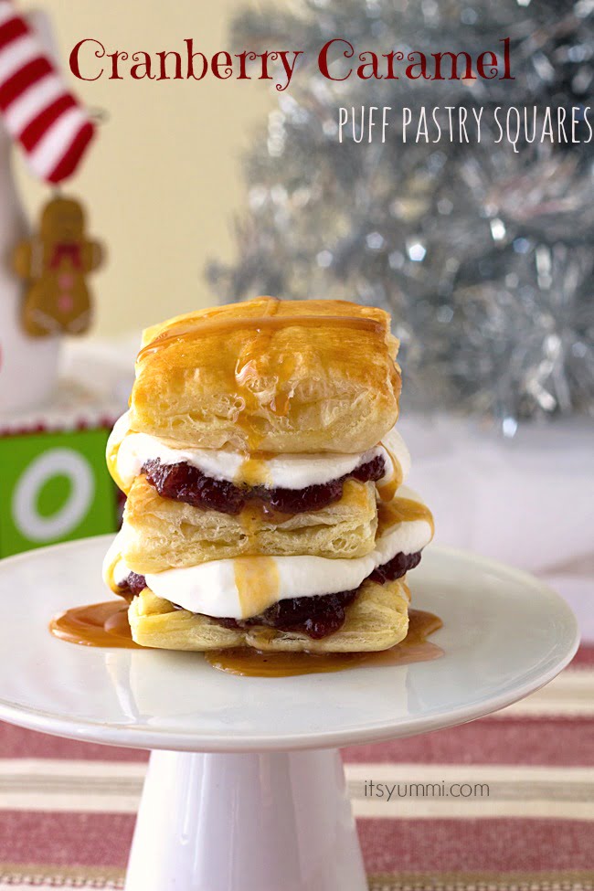 Cranberry Caramel Puff Pastry Dessert Squares - This holiday dessert looks fancy, but it's incredibly easy to put together. It uses store bought puff pastry sheets, cranberry sauce, and whipped cream. Get the recipe from itsyummi.com