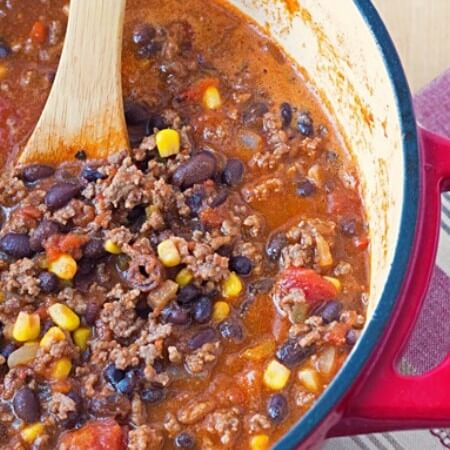Bison black bean chili is like no other chili you've had before! Lean, iron-rich bison is cooked slowly with dark red wine and several layers of spices, bulgur, and fiber-rich black beans to create a healthy and delicious chili!