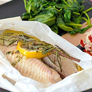 Tilapia en Papillote (Tilapia baked in parchment) - This healthy fish recipe makes a perfect romantic dinner for 2 because the parchment paper is shaped just like a heart! Get the recipe from @itsyummi