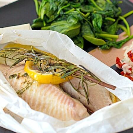 Tilapia en Papillote (Tilapia baked in parchment) - This healthy fish recipe makes a perfect romantic dinner for 2 because the parchment paper is shaped just like a heart! Get the recipe from @itsyummi