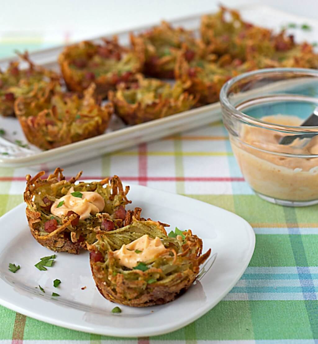 bite sized ham and cheese hash brown potato nests topped with spicy aioli