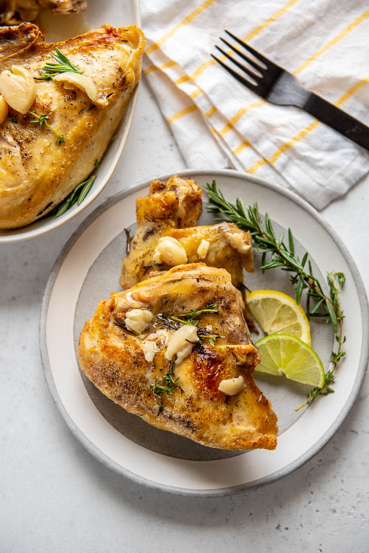 garlic herb oven roasted chicken breast on a plate