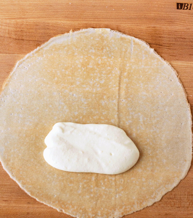 Recipe and tutorial from ItsYummi.com on how to properly make and fold crepes to make cheese blintzes
