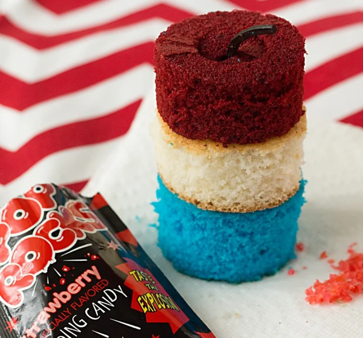 Popping good! Firecracker cupcakes are an easy cupcake dessert with Pop Rocks candy in the middle.
