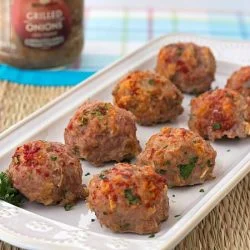 baked turkey meatballs without breadcrumbs on a white serving platter