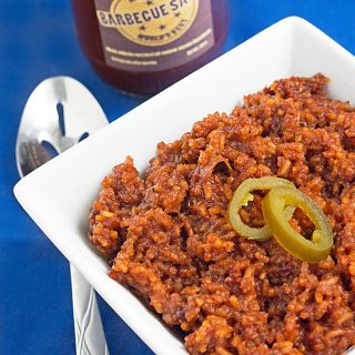 Slow Cooker BBQ Sticky Rice Recipe - Made in a slow cooker & kicked up with a sweet and spicy BBQ sauce. SO delicious!