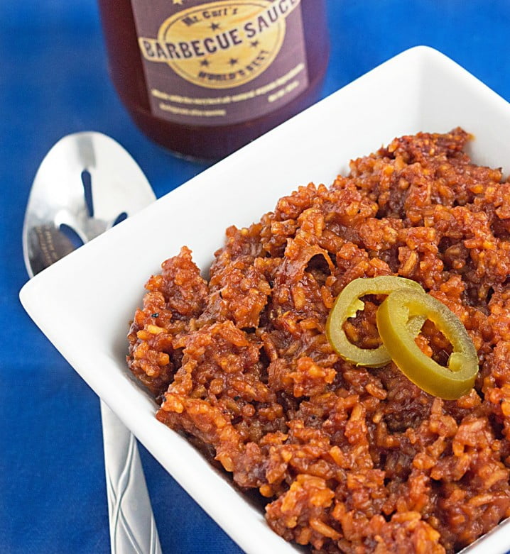 Slow Cooker BBQ Sticky Rice Recipe - Made in a slow cooker & kicked up with a sweet and spicy BBQ sauce. SO delicious!