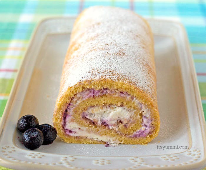 Blueberries and Cream Cake Roll - This easy cake recipe is filled with fresh blueberry preserves and whipped cream. Such an easy dessert recipe! | ItsYummi.com
