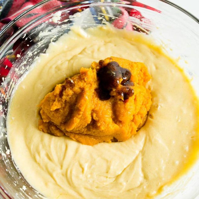 Pumpkin muffin batter in a bowl.