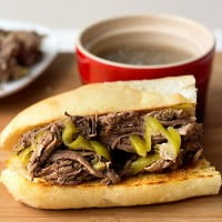 Easy slow cooker Italian beef recipe - this is the best one pot meal I've ever eaten and it's perfect game day food!