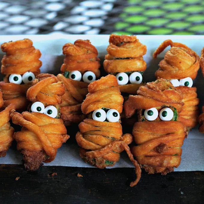 15 Fun Food Creations for Halloween, including Jalapeno Popper Mummies from Simply Sated - find them all on ItsYummi.com