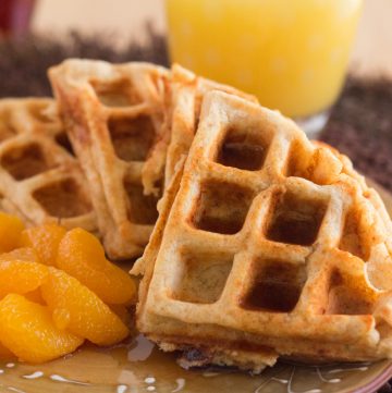 These whole wheat protein blender waffles are easily made in a blender for an easy weekday breakfast or weekend brunch. Freezable too! Get the easy waffles recipe on ItsYummi.com!