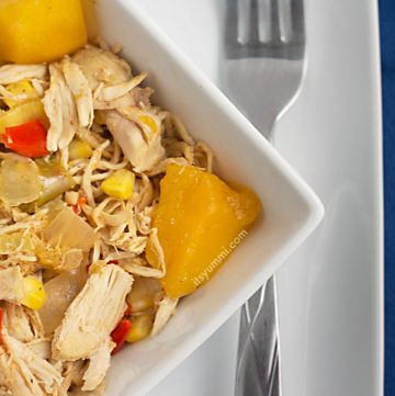 This healthy slow cooker mango chicken recipe is made in a slow cooker or Crock Pot. It uses just 5 ingredients (plus spices), is low fat, and Weight Watcher friendly!