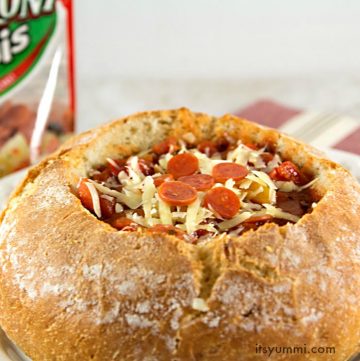 pizza soup recipe served in a bread bowl