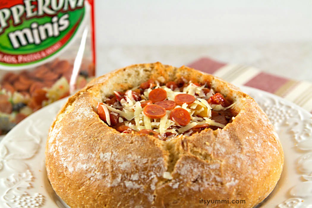 pizza soup recipe served in a bread bowl