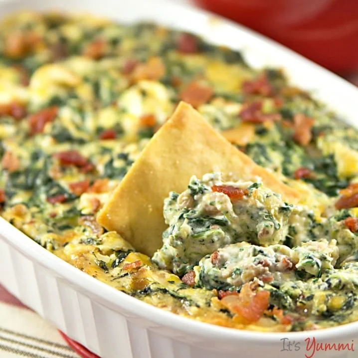WARM CHEESY SPINACH DIP WITH BACON - This is the best spinach dip recipe I've ever made! Probably because it's lower in fat and low carb, too! - from ItsYummi.com