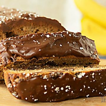 chocolate chip banana bread recipe with a layer of chocolate ganache on top. This is a banana bread lover's snack!