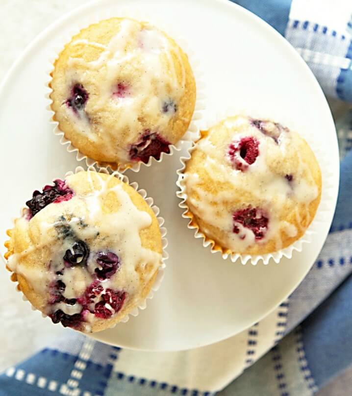 This berry muffins recipe takes just 15 minutes to make. Use frozen fruit instead of fresh and they come out SO moist! From ItsYummi.com