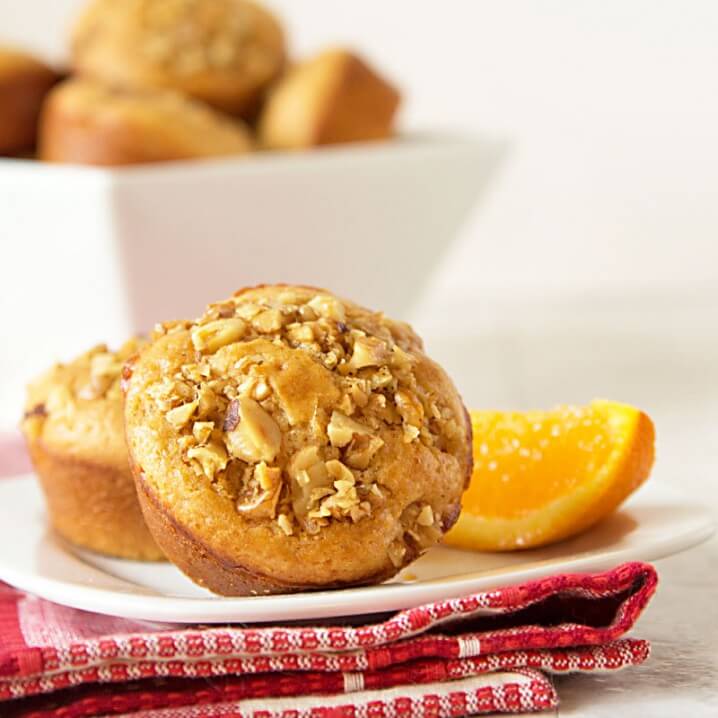 Recipe for Pancake Muffins with Brown Butter Glazed Walnuts - Fluffy pancakes with no flipping involved! Perfect for breakfast on the go, too. Recipe on ItsYummi.com for #brunchweek