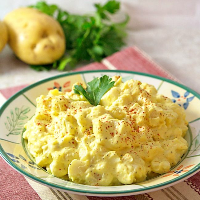 Southern Style Mustard Potato Salad Recipe. Tender potatoes, crunchy celery, mustard, eggs, and a creamy dressing make this side dish a family favorite.