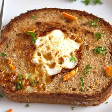 Moon Over Miami Egg - This is a classic fried egg breakfast! Also known as Toad in a Hole or Bird in a Nest, it's a cage-free egg that's cooked inside of whole grain, Harvest Selects Seeded Bread from @PepperidgeFarm - Get the recipe from @itsyummi (AD)