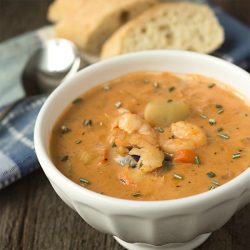 Creamy Seafood Chowder - This creamy seafood chowder recipe begins with an easy-to-make homemade seafood stock, to which potatoes, shrimp, crab, and lobster meat are added. | Recipe on itsyummi.com