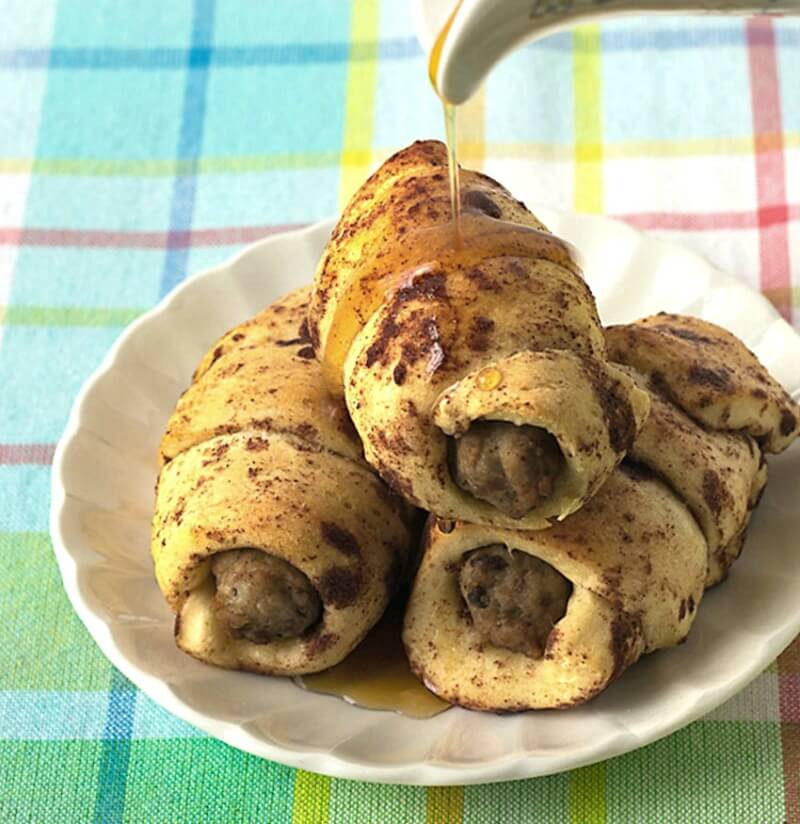 Maple sausage cinnamon roll bundles are a sweet treat with a savory center. This is the best cinnamon rolls recipe for a grab 'n go breakfast or brunch.