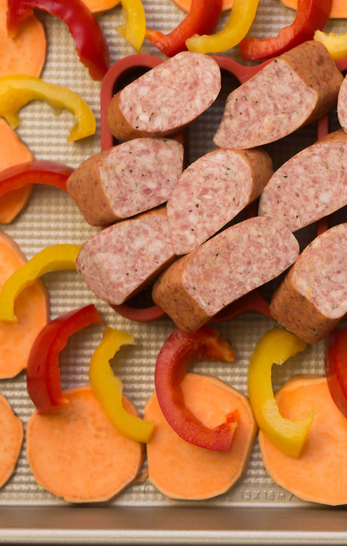 Sausage Sheet Pan Dinner with Sweet Potatoes and Bell Peppers