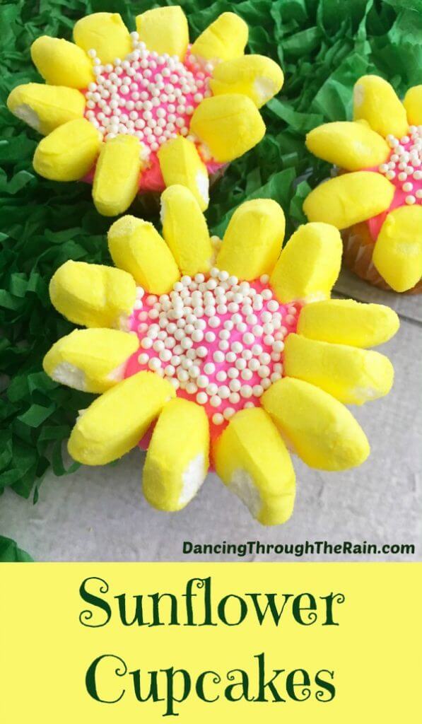 titled image - sunflower cupcakes - photo shows cupcakes that look like yellow sunflowers, with petals made from marshmallow Peeps