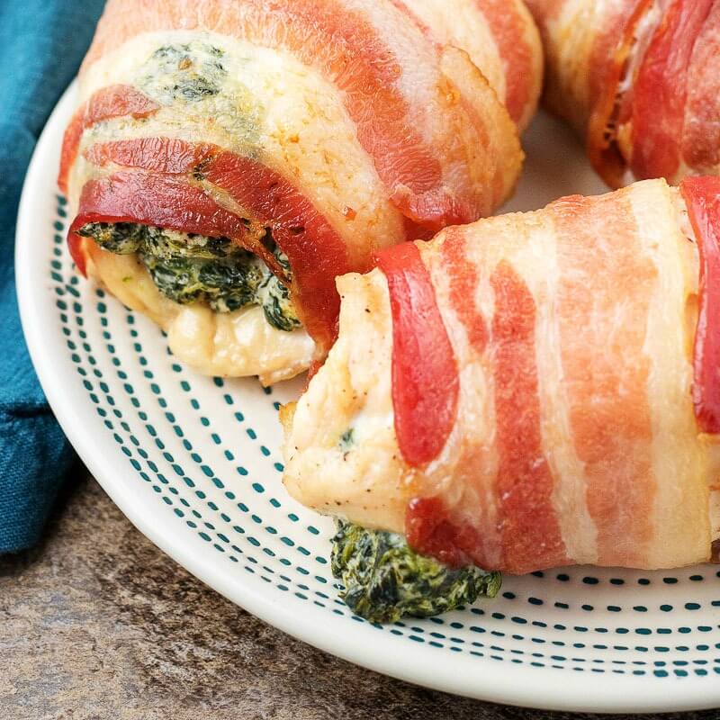 closeup image of bacon wrapped chicken bundles