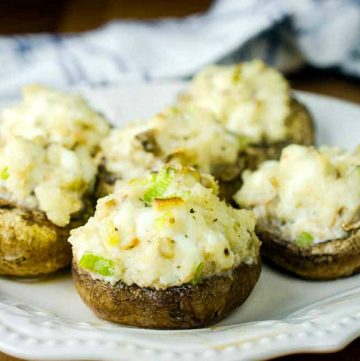 a plate of stuffed mushroom appetizers