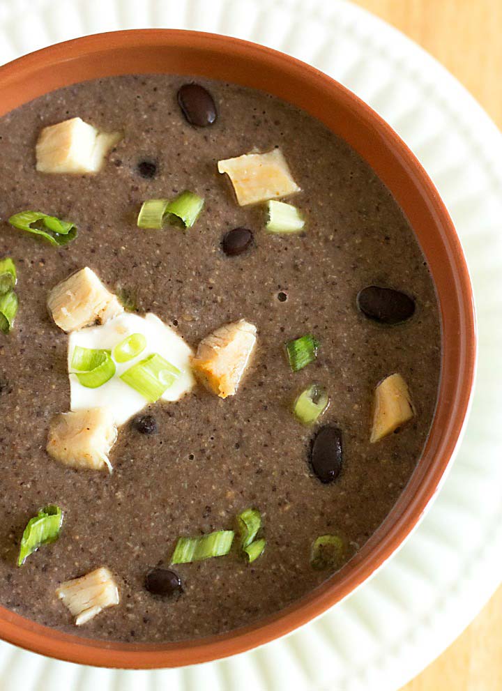 bowl of spicy chicken soup with black beans