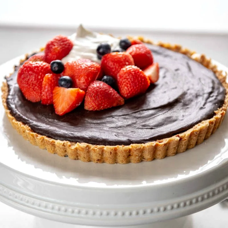 chocolate tart with fresh strawberries and blueberries