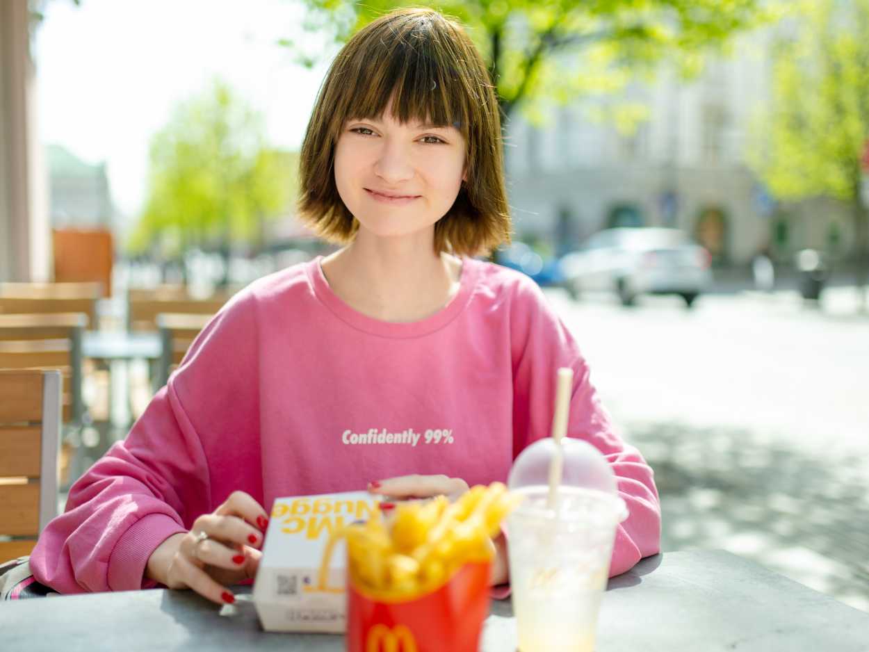 Girl eating McDonalds